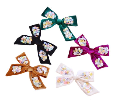 kids velvet bow color green, black. purple, orange and ivory embellished with sequins